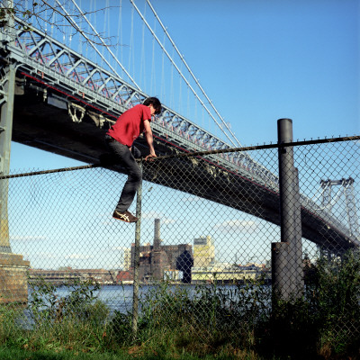 Young Man Jumping Fence by Justin Ouellette Pricing Limited Edition Print image