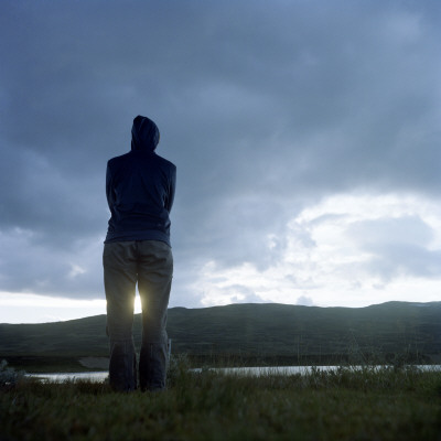 A Person Standing By A Lake In Jamtland, Sweden by Maria Olsson Pricing Limited Edition Print image