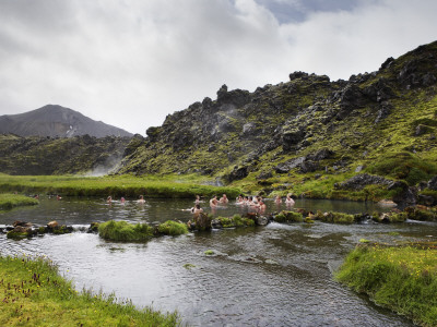 People In A Hot Spring At Landmannalaugar, Iceland by Atli Mar Pricing Limited Edition Print image
