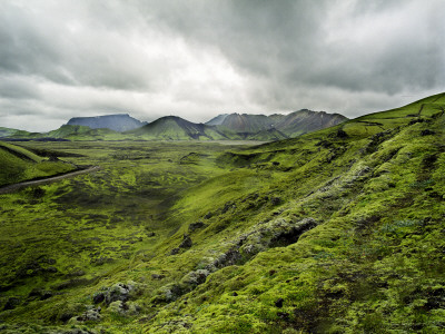 Mossy Hills And Mountains In Background by Atli Mar Pricing Limited Edition Print image