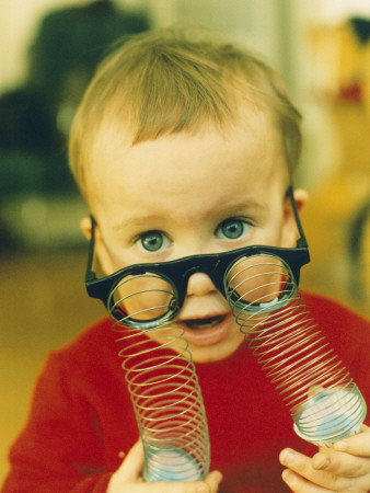 A Little Boy Playing With His Toy Glasses by Jann Lipka Pricing Limited Edition Print image