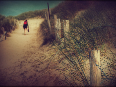 Girl Walking Up Dunes by Joep Roosen Pricing Limited Edition Print image