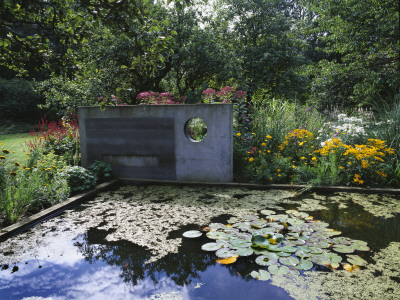Concrete Sculpture Over Lily Pond, Designer: Duncan Heather, Greystone Cottage, Oxfordshire by Clive Nichols Pricing Limited Edition Print image