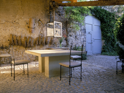 La Chabaude, France - Cobbled Terrace With Table And Chairs, Designer: Scott Stover by Clive Nichols Pricing Limited Edition Print image