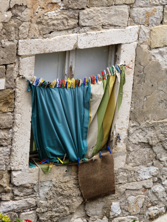 Stone Window Frame With Hanging Washing In Dubrovnik, Croatia, by Olwen Croft Pricing Limited Edition Print image