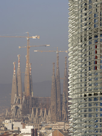 Torre Agbar, 2005, And Sagrada Familia By Antoni Gaudi, Barcelona, Catalonia by Richard Bryant Pricing Limited Edition Print image