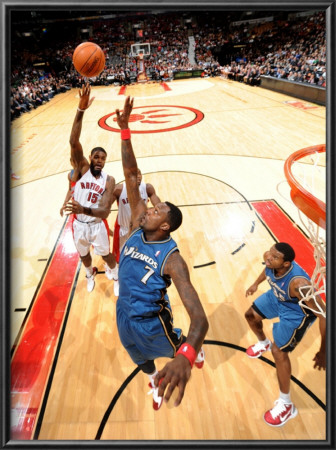 Washington Wizards V Toronto Raptors: Amir Johnson And Andray Blatche by Ron Turenne Pricing Limited Edition Print image