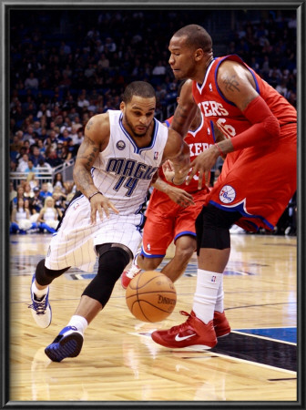 Philadelphia 76Ers V Orlando Magic: Jameer Nelson And Marreese Speights by Sam Greenwood Pricing Limited Edition Print image