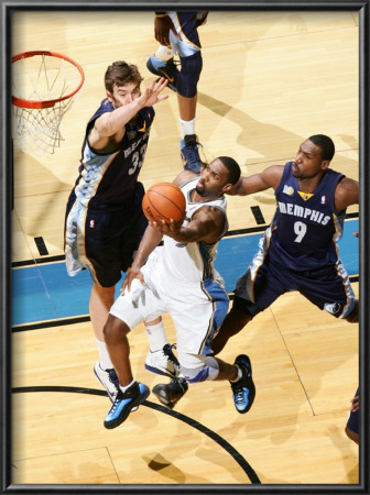 Memphis Grizzlies V Washington Wizards: Gilbert Arenas And Marc Gasol by Ned Dishman Pricing Limited Edition Print image