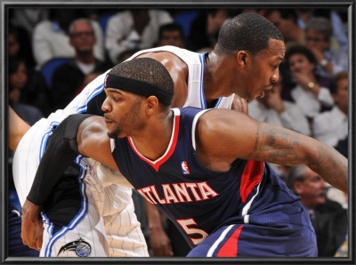 Atlanta Hawks V Orlando Magic: Josh Smith And Dwight Howard by Fernando Medina Pricing Limited Edition Print image