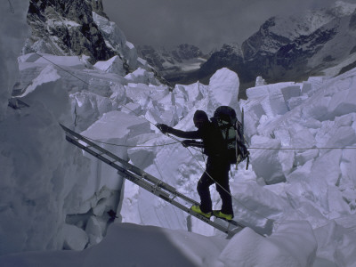 Climbing Across Ladder On Everest, Nepal by Michael Brown Pricing Limited Edition Print image