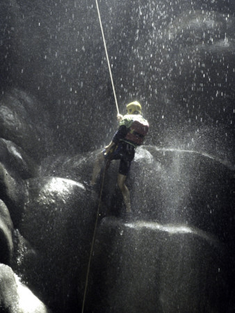 Climber Showered With Water In Cave, Mexico by Michael Brown Pricing Limited Edition Print image