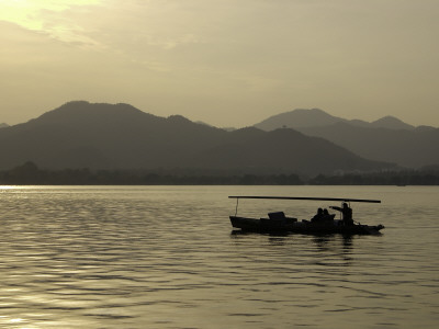 Twilight View Of A Small Boat On West Lake, China by Ryan Ross Pricing Limited Edition Print image