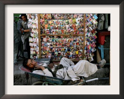 A Casual Labourer Rests, Downtown Kabul, Afghanistan, During The Afghan Weekend, June 2, 2006 by Rodrigo Abd Pricing Limited Edition Print image