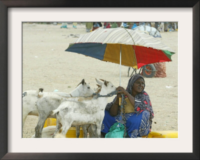 A Somaliland Woman Waits For Customers, In Hargeisa, Somalia September 27, 2006 by Sayyid Azim Pricing Limited Edition Print image