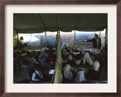 Afghan Teachers Give A Language Lesson To Boys And Girls by Rodrigo Abd Pricing Limited Edition Print image