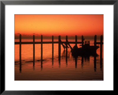 Silhouette Of Boat At Sunset, Fl by Don Romero Pricing Limited Edition Print image