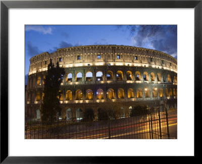 The Colosseum At Night With Traffic Trails, Rome, Lazio, Italy by Christian Kober Pricing Limited Edition Print image