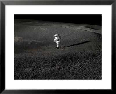Spacesuit Engineer Simulates Work Inside A Crater In Johnson Space Center's Lunar Yard by Stocktrek Images Pricing Limited Edition Print image
