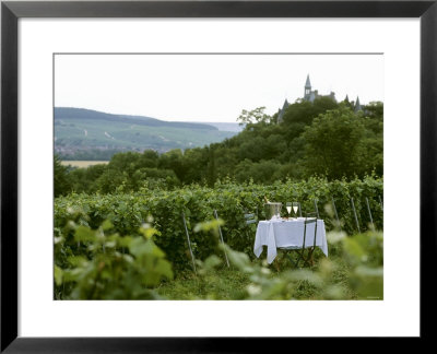 Table With Champagne Glasses In Vineyard In Champagne by Joerg Lehmann Pricing Limited Edition Print image