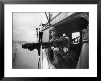 Crew Chief Lance Cpl. James C. Farley Manning Helicopter Machine Gun Of Yankee Papa 13 by Larry Burrows Pricing Limited Edition Print image