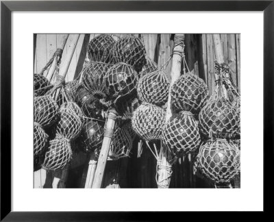 Glass Net Floats Being Used In Groups To Hold Afloat Net Markers Which Are Poles With Small Flag by Eliot Elisofon Pricing Limited Edition Print image
