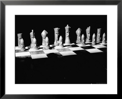 View Showing Chess Pieces With Faces Carved Into Them by David Scherman Pricing Limited Edition Print image