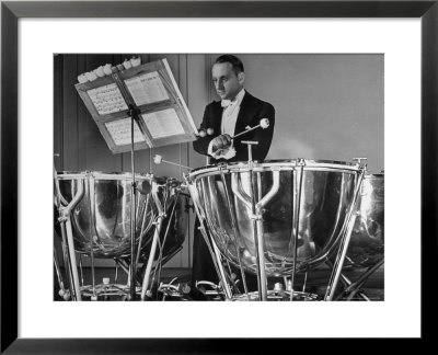 Percussionist Saul Goodman Playing The Tympani In The New York Philharmonic by Margaret Bourke-White Pricing Limited Edition Print image