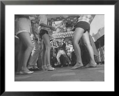 Teenagers In A Record Shop Watch 13 Year Old Steve Shad Imitate Moves Of Rock Star Elvis Presley by Robert W. Kelley Pricing Limited Edition Print image