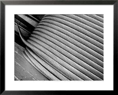 Thick Aluminum Cable Being Wound On A Huge Spool, Aluminum Company Of America Factory by Margaret Bourke-White Pricing Limited Edition Print image