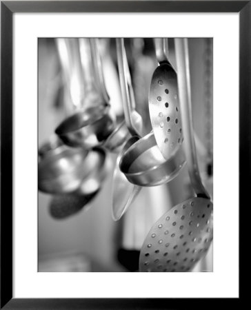Ladles And Slotted Spoons Hanging Up In A Kitchen by Huw Jones Pricing Limited Edition Print image