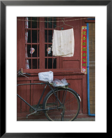 Bicycle And Wall, Old Town, Dali, Yunnan Province, China by Walter Bibikow Pricing Limited Edition Print image