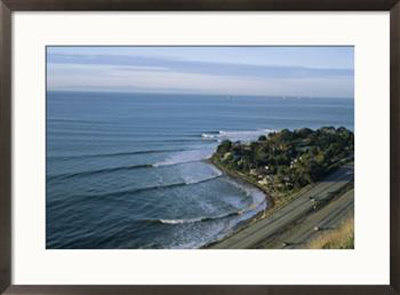 Epic Winter Surf Hitting Rincon Point by Rich Reid Pricing Limited Edition Print image
