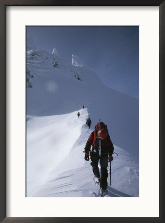 Mountain Climbers Approach The Spire Of Fickle Finger Of Fate by Gordon Wiltsie Pricing Limited Edition Print image
