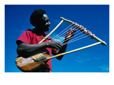 Man Playing Local Stringed Instrument At Kebirigo, Kenya by Eric Wheater Pricing Limited Edition Print image