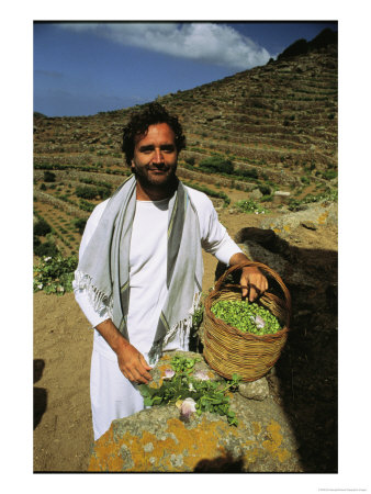 Portrait Of A Man Holding A Basket Full Of Capers by Ed George Pricing Limited Edition Print image