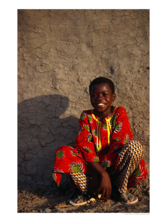 Young Boy Sitting In Front Of Wall, Djenne, Mali by Ariadne Van Zandbergen Pricing Limited Edition Print image