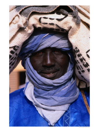 Close Up Of A Tuareg Carpet Seller In Traditional Indigo Clothing, Timbuktu, Mali by Patrick Syder Pricing Limited Edition Print image