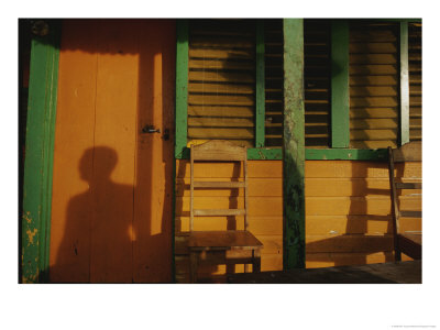 A Colorful House Catches The Shadow Of A Passerby by Raul Touzon Pricing Limited Edition Print image