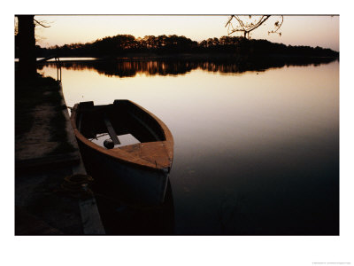 A Half-Sunken Rowboat Along An Inlet Of The Chesapeake Bay by Stephen St. John Pricing Limited Edition Print image