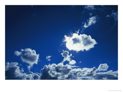 Sunlit Fluffy White Clouds In A Blue Sky by Jason Edwards Pricing Limited Edition Print image