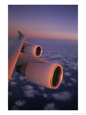 A Close View Of The Wing And Jet Engines Of A Plane In Flight by Paul Chesley Pricing Limited Edition Print image