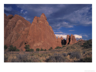 Sandstone Rock Formations In Arches National Park by Charles Kogod Pricing Limited Edition Print image