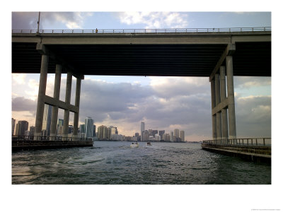 Downtown Miami Skyline Through A Biscayne Bay Bridge by Raul Touzon Pricing Limited Edition Print image