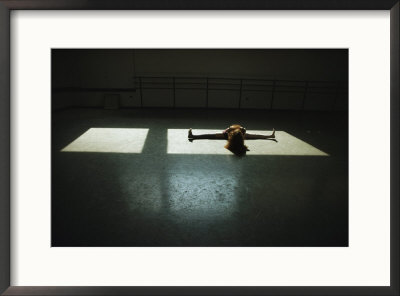 A Young Dance Student Limbers Up In A Juilliard School Studio by Jodi Cobb Pricing Limited Edition Print image