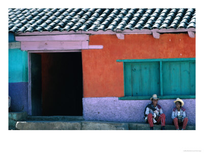 Two Mayan Boys Sitting In Front Of House, Todos Santos Cuchumatan, Guatemala by Jeffrey Becom Pricing Limited Edition Print image