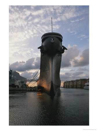 Battleship U.S.S. Wisconsin Illuminated By The Setting Sun by Todd Gipstein Pricing Limited Edition Print image