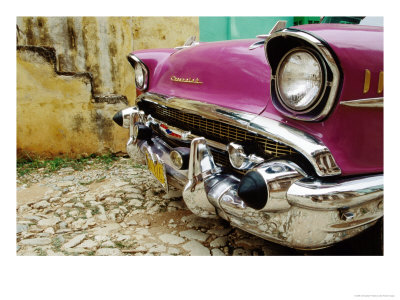 1957 Chevy Bel-Air Car Front Grill And Bumper In Cobbled Street, Trinidad, Cuba by Christopher P Baker Pricing Limited Edition Print image
