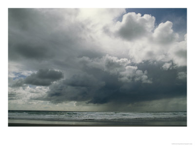 Dramatic Storm Clouds Over Ocean Water by Charles Kogod Pricing Limited Edition Print image