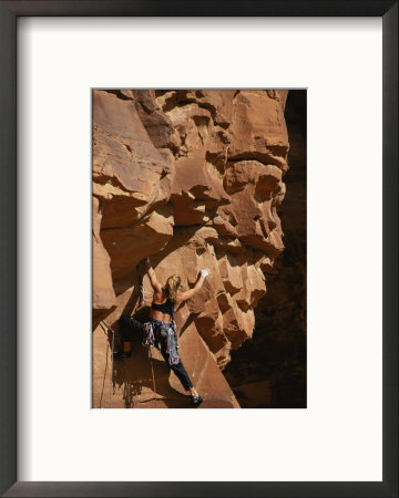 A Woman Climbs Sandstone Cracks In Utah by Bobby Model Pricing Limited Edition Print image
